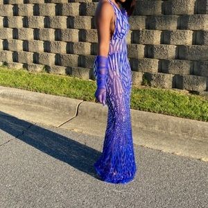 Royal blue, stretch material… can fit up to a size M!